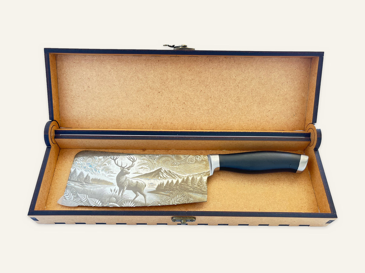 Spirit of the Outdoors smooth-handle cleaver inside its open MDF presentation box
