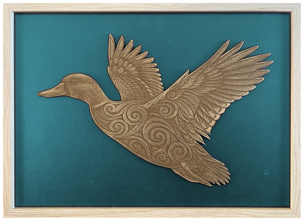 Koru Duck — Side engraved cutout artwork with teal background and Ashwood frame — colour visualisation, not a new photograph.