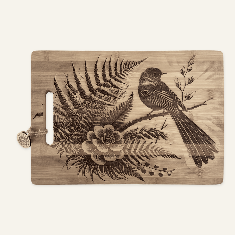 Fantail Flower artwork engraved on a bamboo board