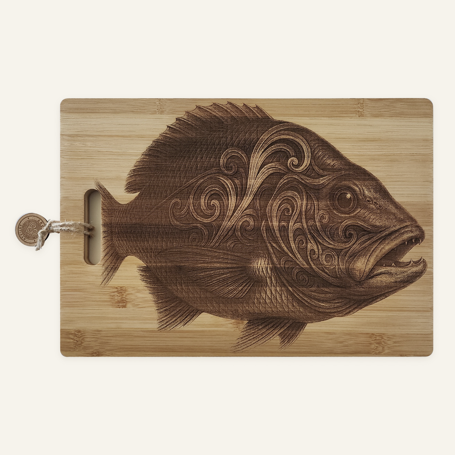 Mighty Snapper artwork engraved on a bamboo board