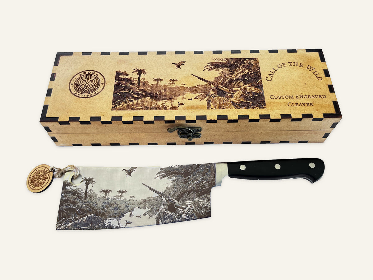 Call of the Wild three-rivet cleaver beside its matching engraved MDF presentation box