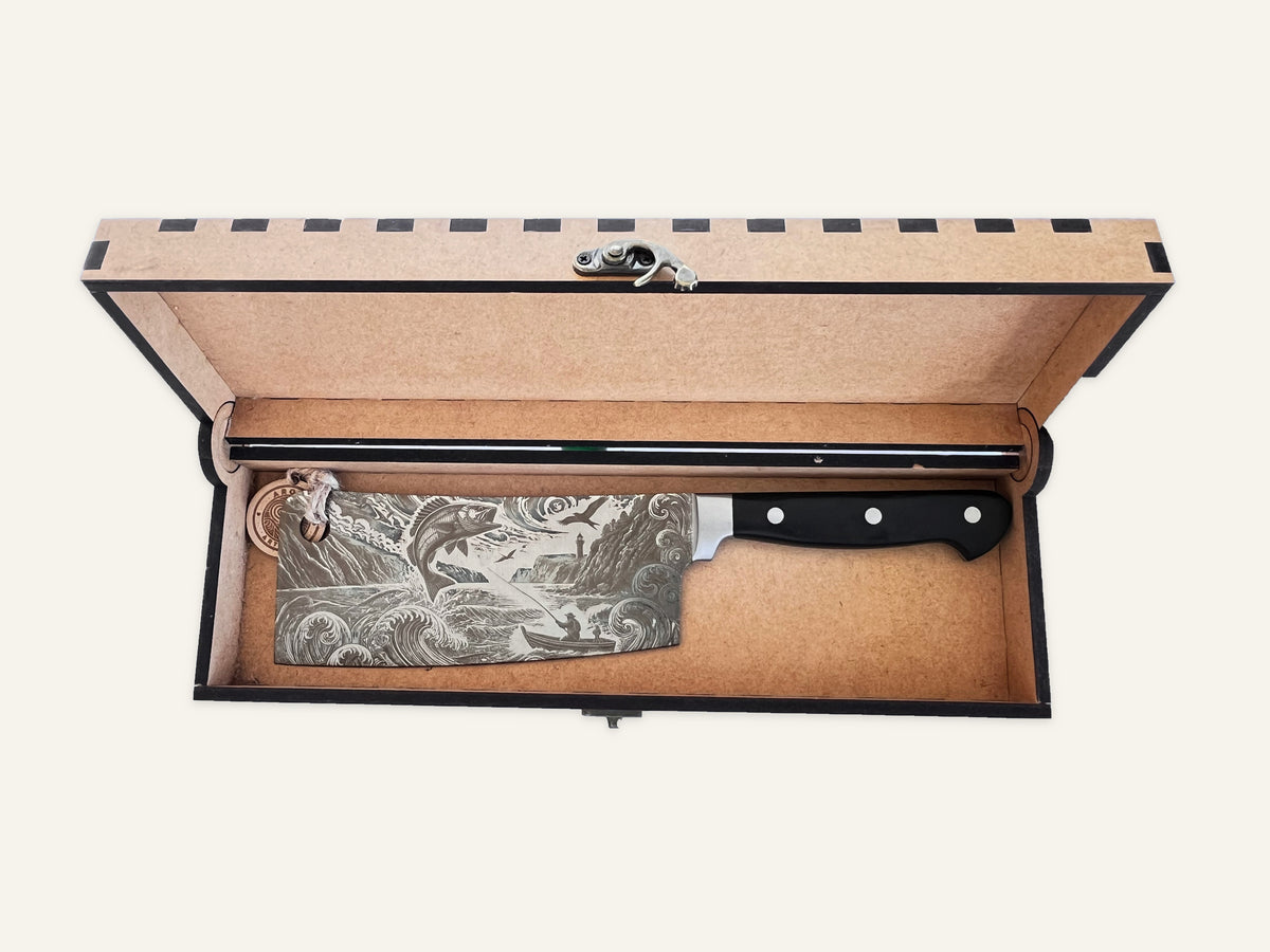 Fishing Spirit three-rivet cleaver inside its open engraved MDF presentation box
