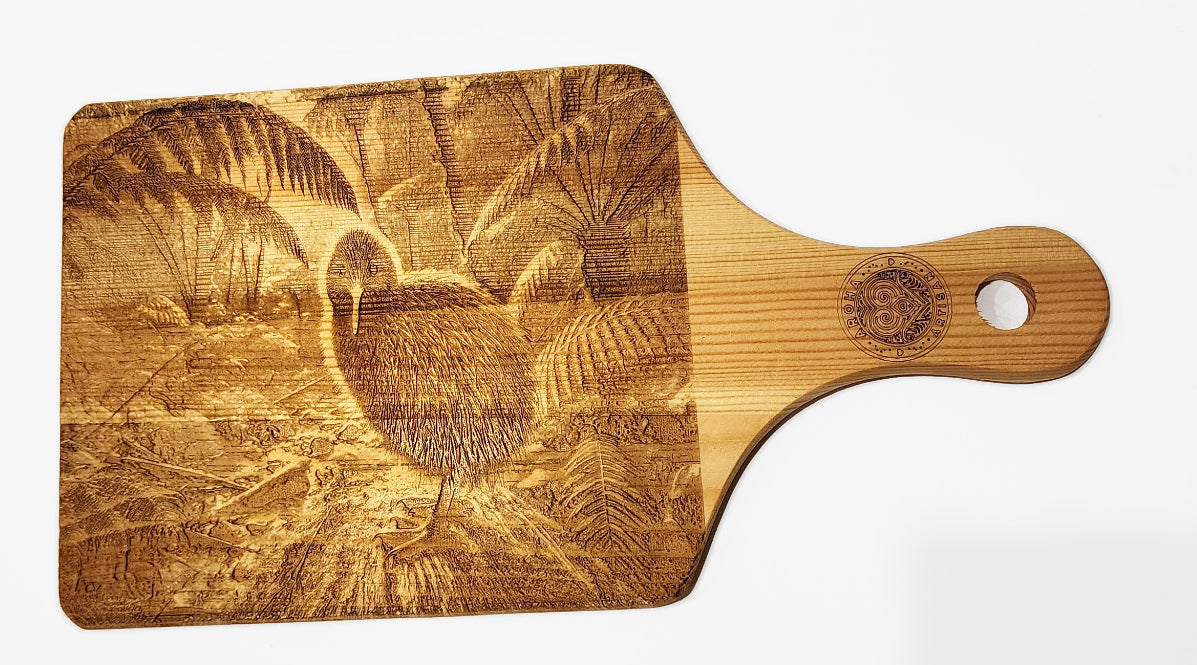 Kiwi front design on an Aroha Artisan mini engraved wooden board, showing a front-facing kiwi in a fern-lined forest.