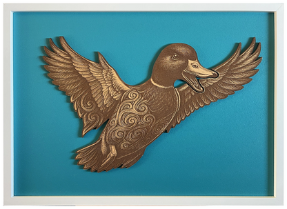 Duck — Front engraved cutout artwork in an A2-size white frame with a deep teal background