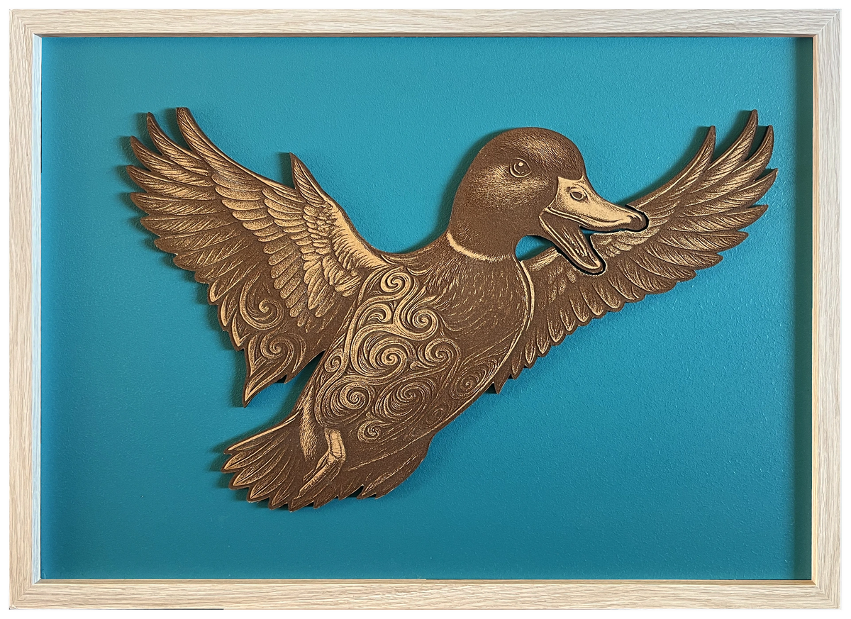 Duck — Front engraved cutout artwork with teal background and Ashwood frame — frame-finish composite and colour visualisation, not a new photograph.
