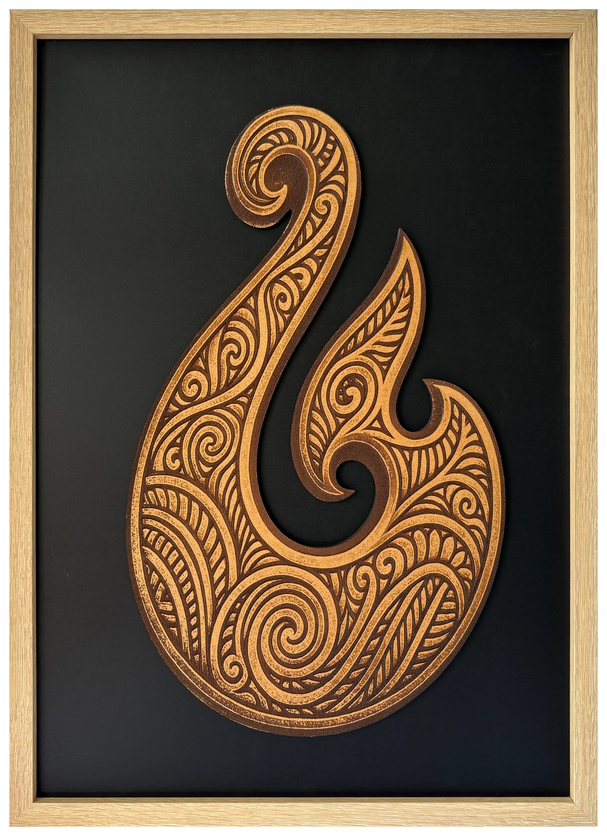 Hei Matou engraved cutout artwork against a black background in an A2-size Ashwood-finish wood-grain frame