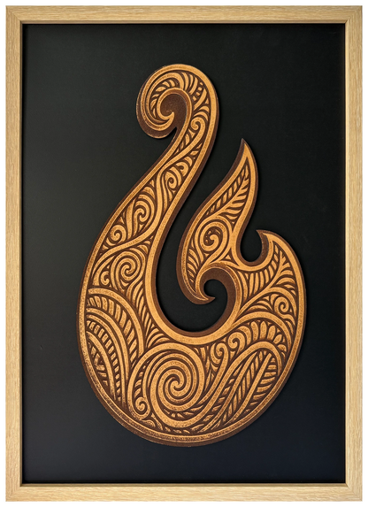 Hei Matou engraved cutout artwork against a black background in an A2-size Ashwood-finish wood-grain frame