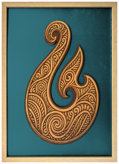 Hei Matou engraved cutout artwork with teal background and Ashwood frame — colour visualisation, not a new photograph.