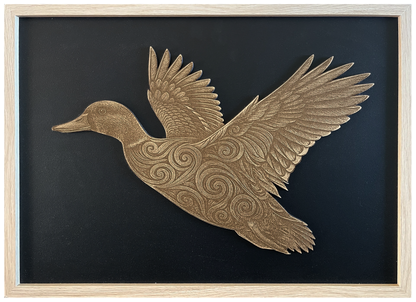 Koru Duck — Side engraved cutout artwork in an A2-size Ashwood-finish frame with a black background