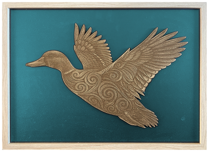 Koru Duck — Side engraved cutout artwork with teal background and Ashwood frame — colour visualisation, not a new photograph.