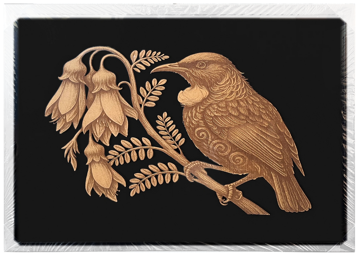 Tūī and Kōwhai engraved cutout artwork with black background and White frame — colour visualisation, not a new photograph.