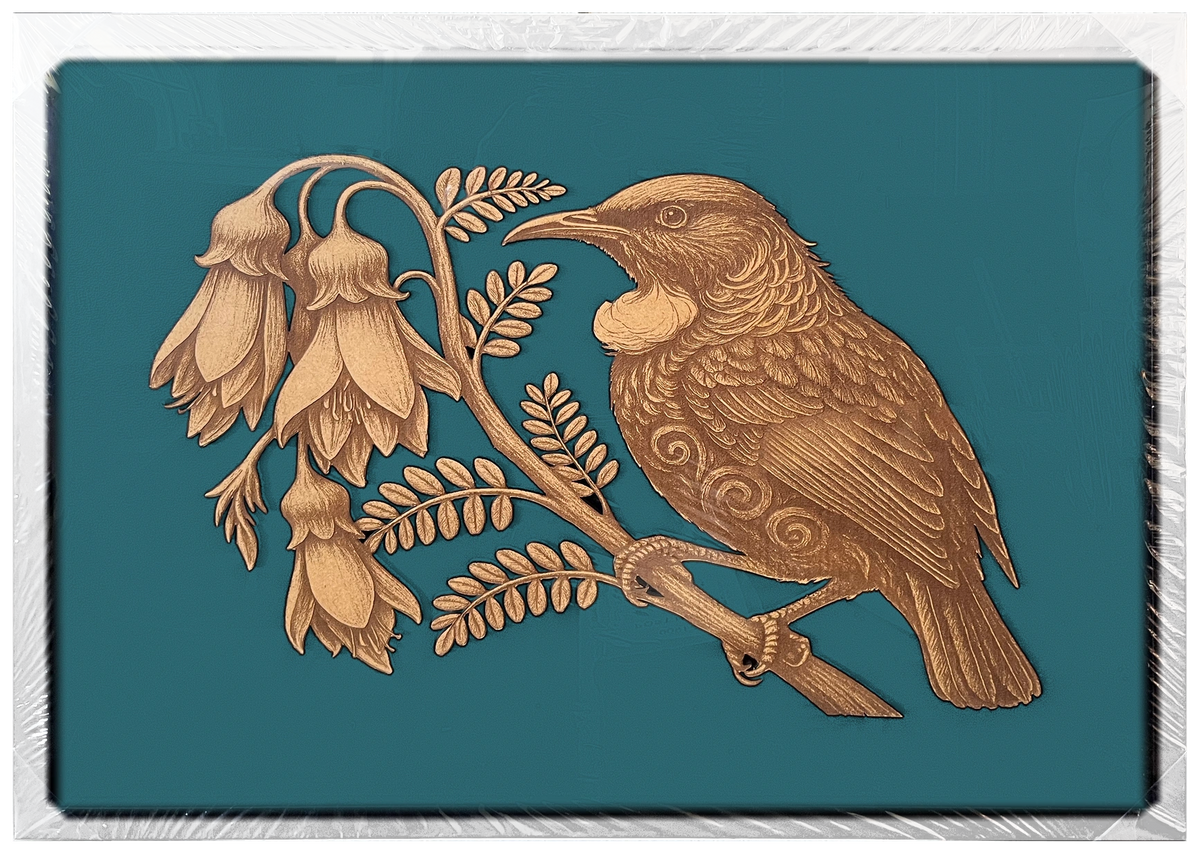 Tūī and Kōwhai engraved cutout artwork with teal background and White frame — colour visualisation, not a new photograph.